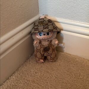 Authentic labubu with free Gucci outfit